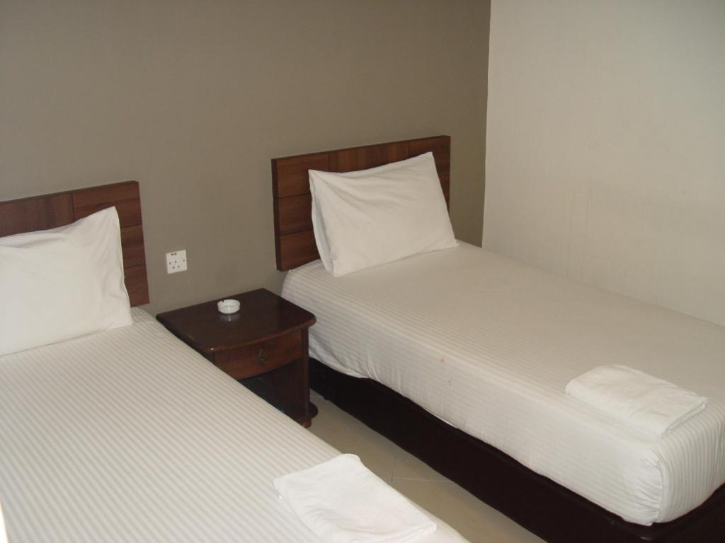 Jb City Hotel Johor Bahru Oda fotoğraf