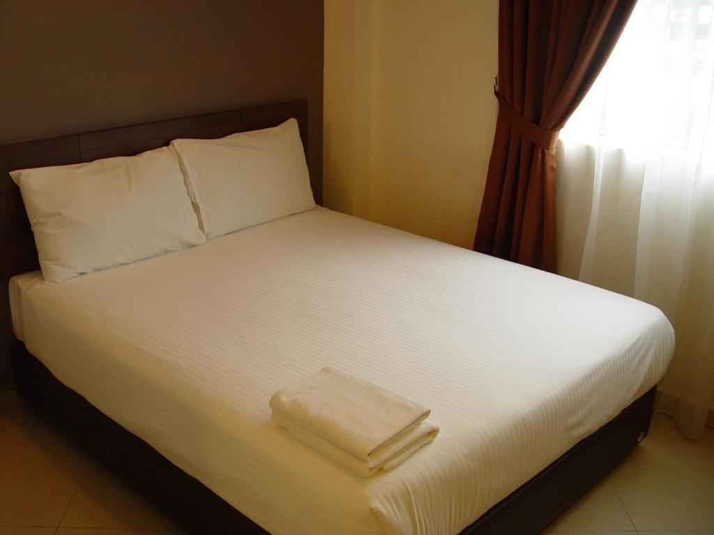 Jb City Hotel Johor Bahru Oda fotoğraf