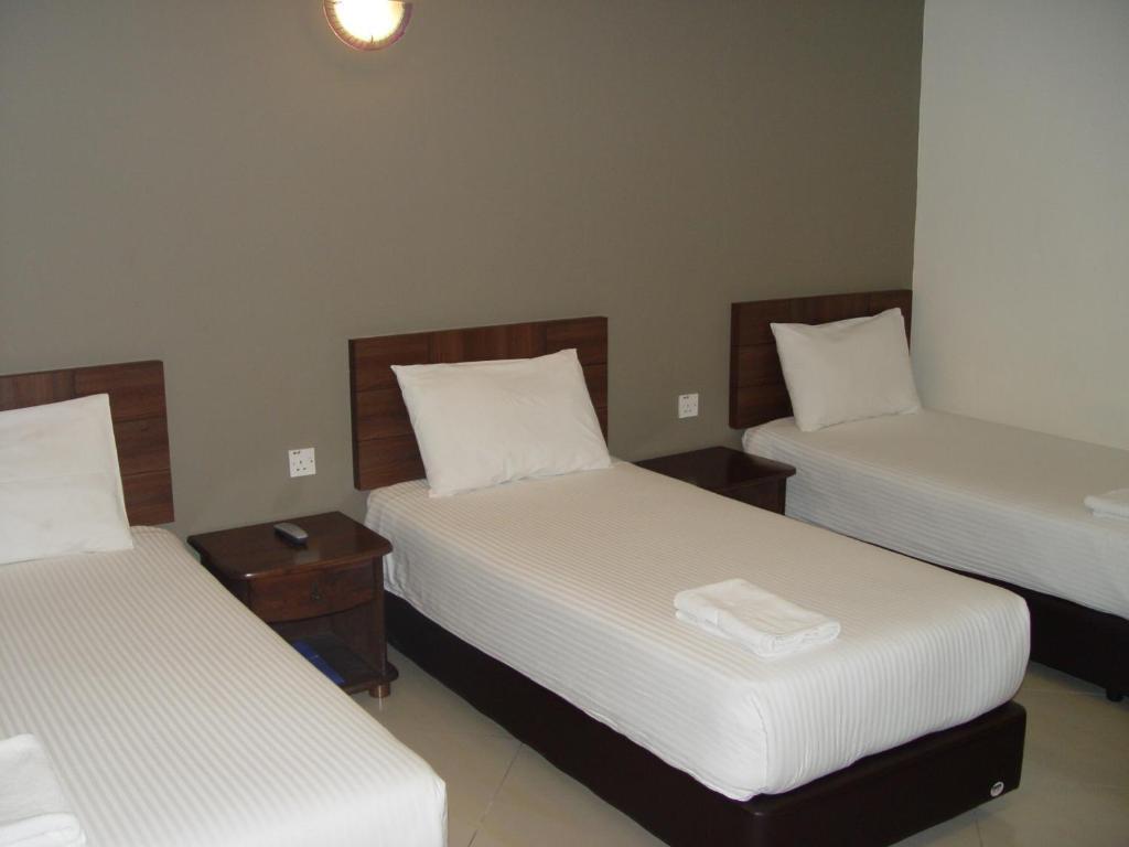 Jb City Hotel Johor Bahru Oda fotoğraf